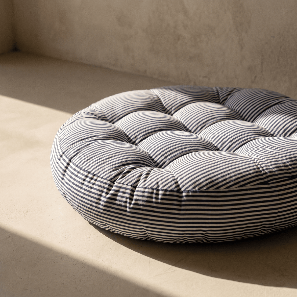 Coussin de Sol Rond Capitonné Rayé